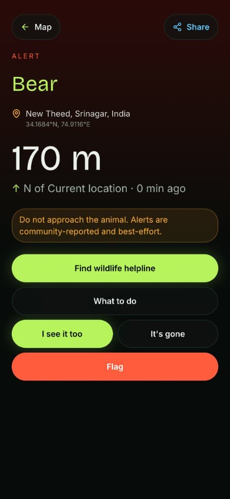 Wildping alert detail for a bear sighting, with distance, safety reminder, and helpline actions.